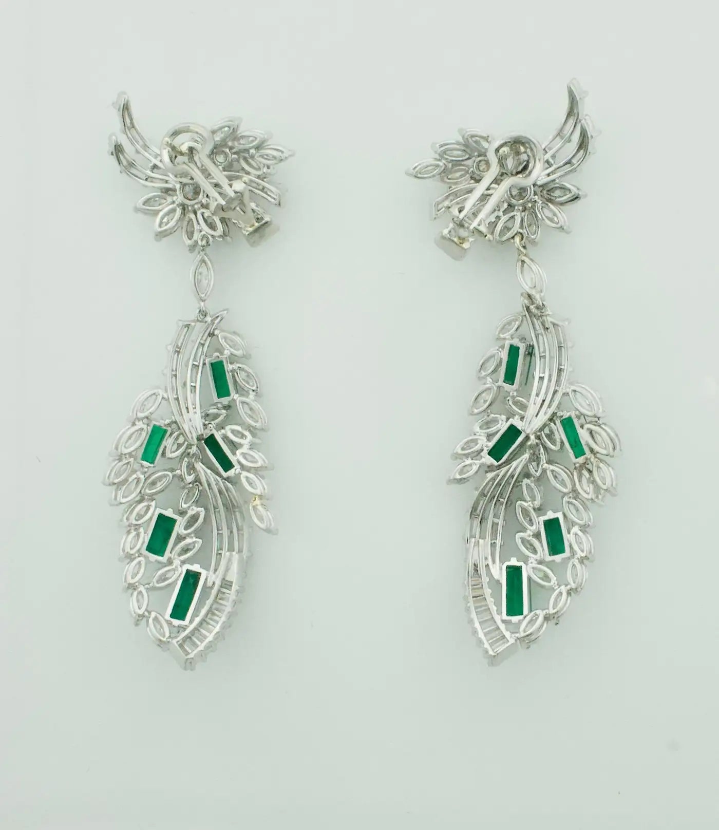 Circa 1950's Dangling Diamond and Emerald Earrings in Platinum