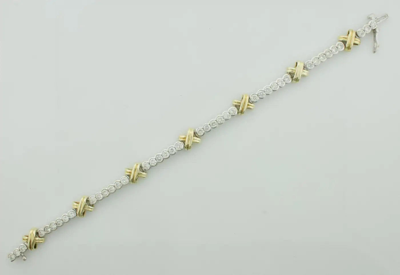 Yellow and White Gold Diamond "X" Tennis Bracelet