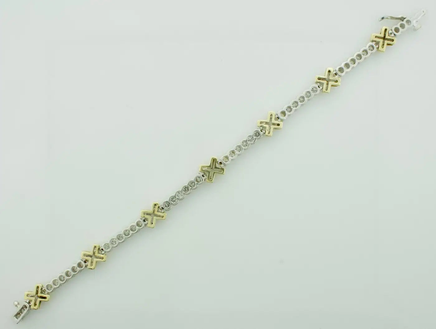 Yellow and White Gold Diamond "X" Tennis Bracelet