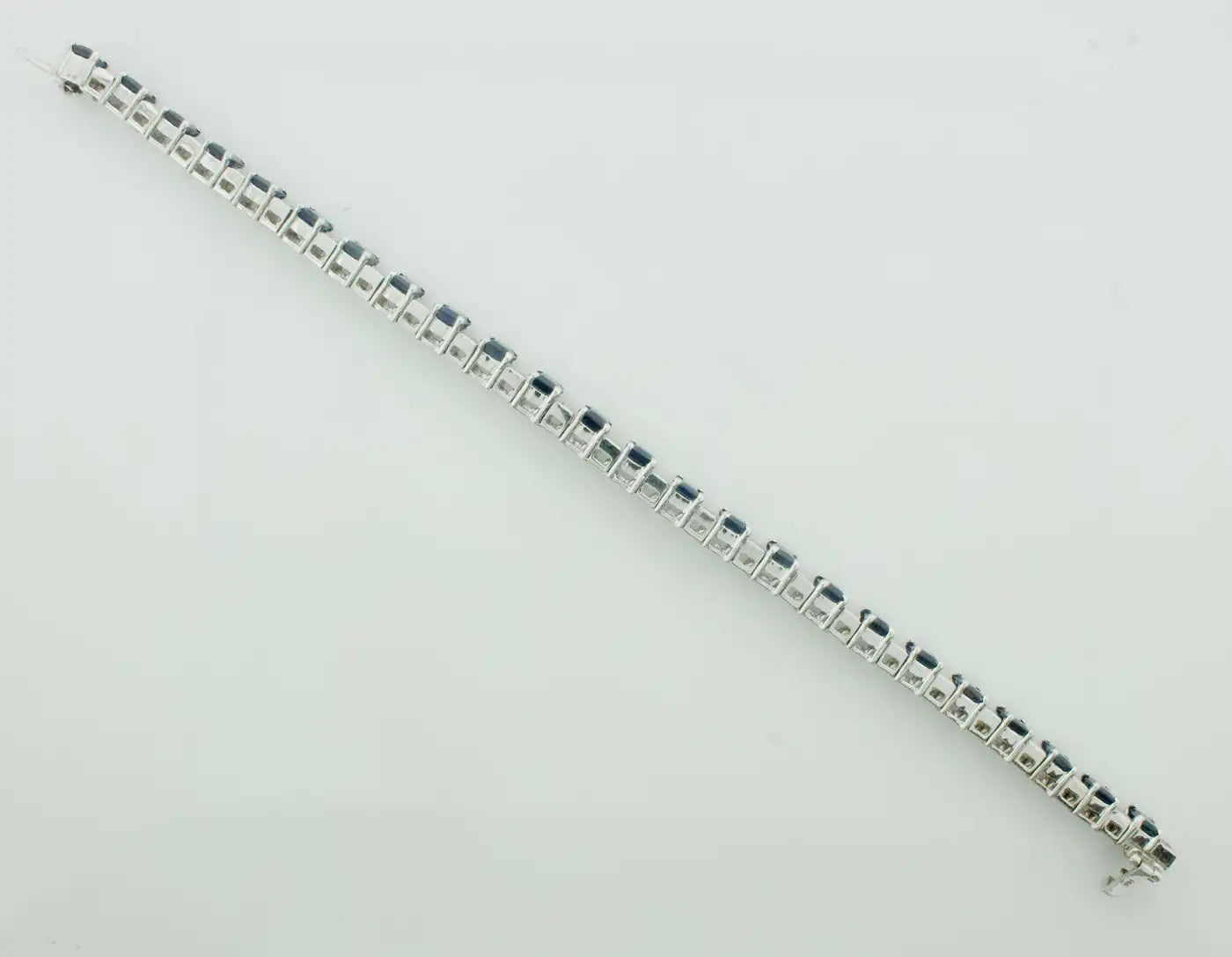 Emerald Cut Sapphire and Diamond Tennis Bracelet in 18k