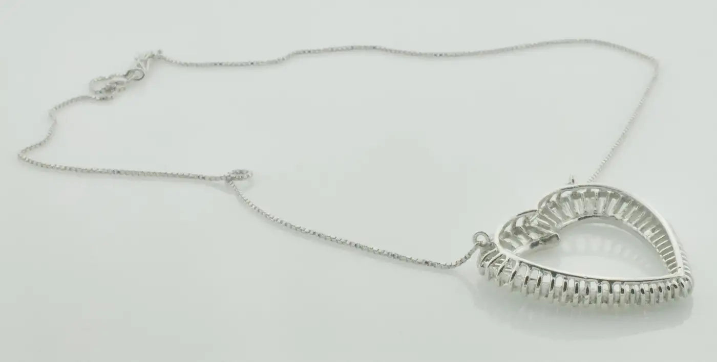 Platinum Diamond Baguette Heart Necklace 3.00 Carats Circa 1960's