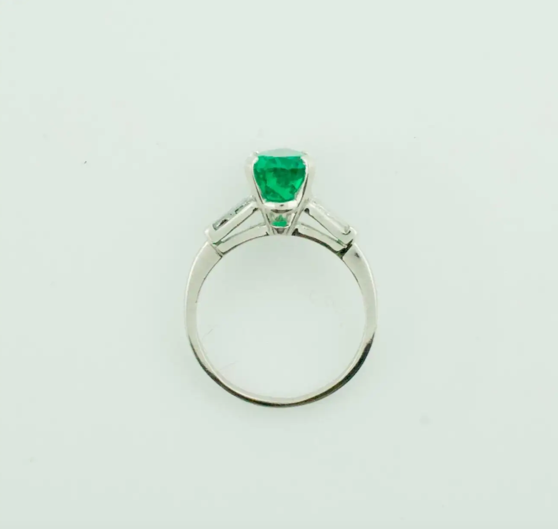 Emerald and Diamond Classic Solitaire Ring in Platinum