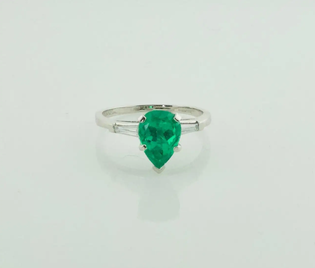 Emerald and Diamond Classic Solitaire Ring in Platinum