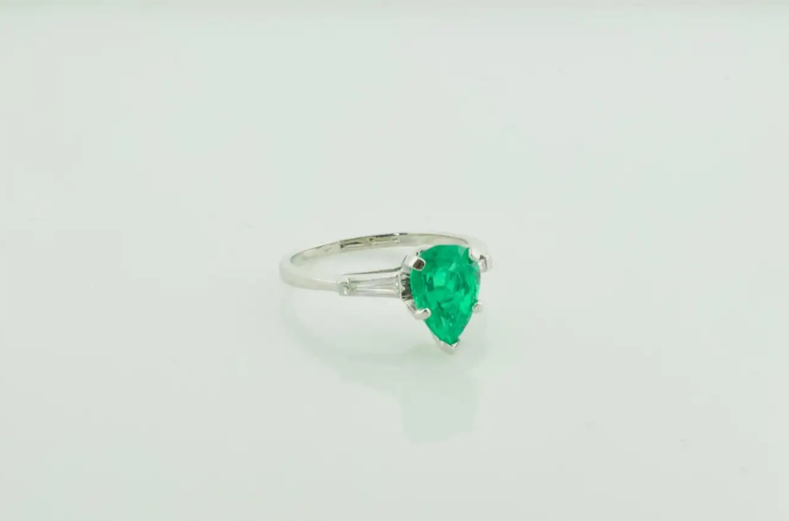 Emerald and Diamond Classic Solitaire Ring in Platinum