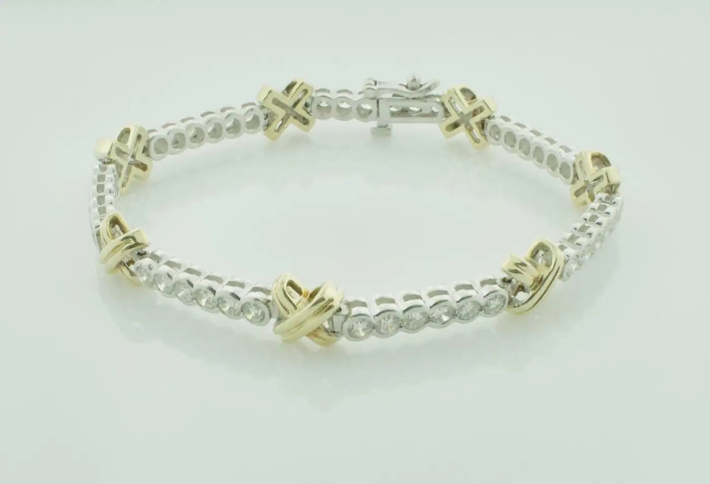 Yellow and White Gold Diamond "X" Tennis Bracelet