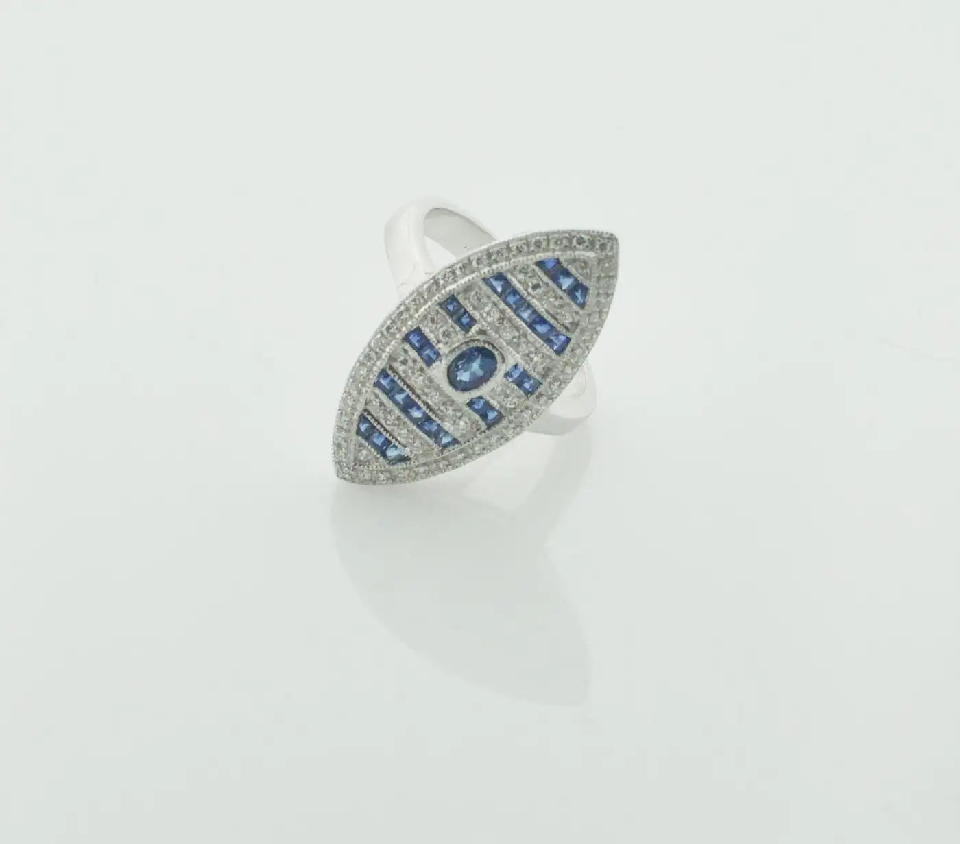 Diamond and Sapphire Marquise Shaped Ring in 18k